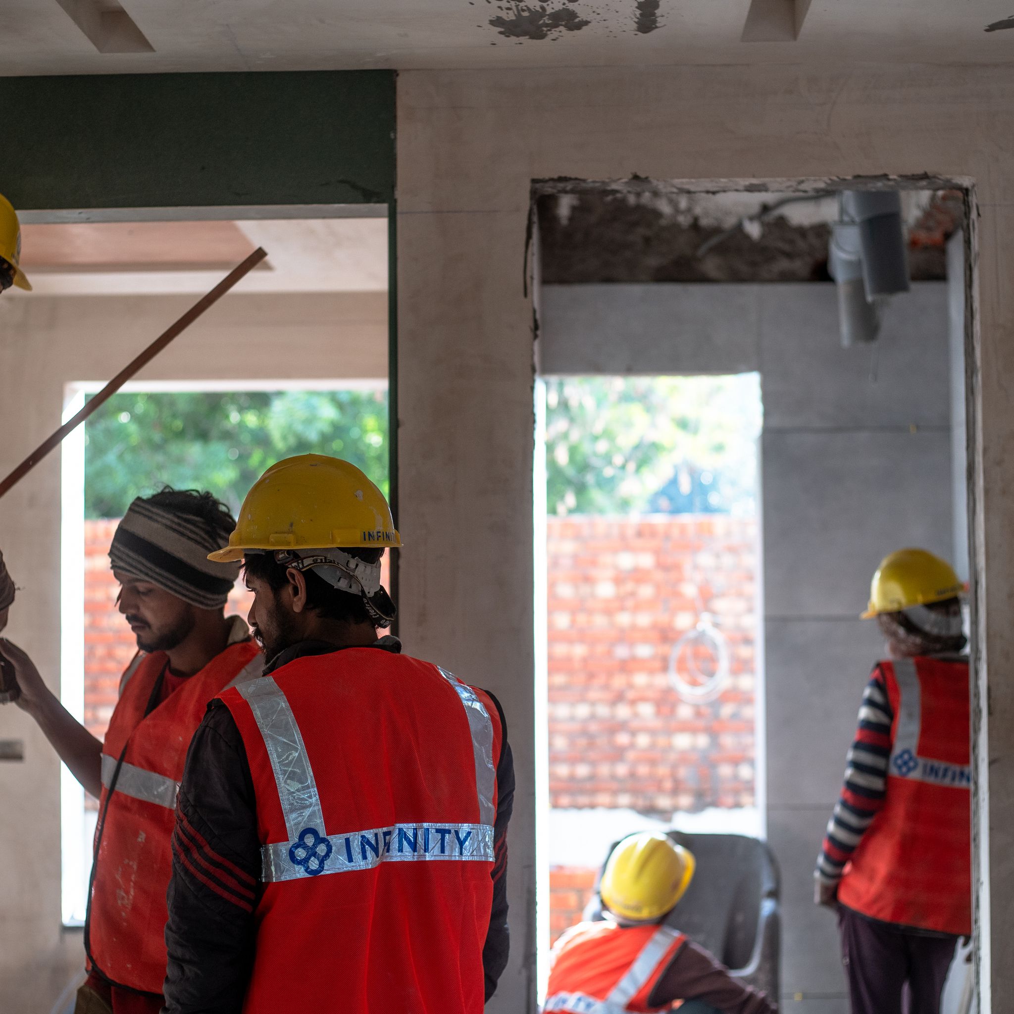 Construction crew framing a house