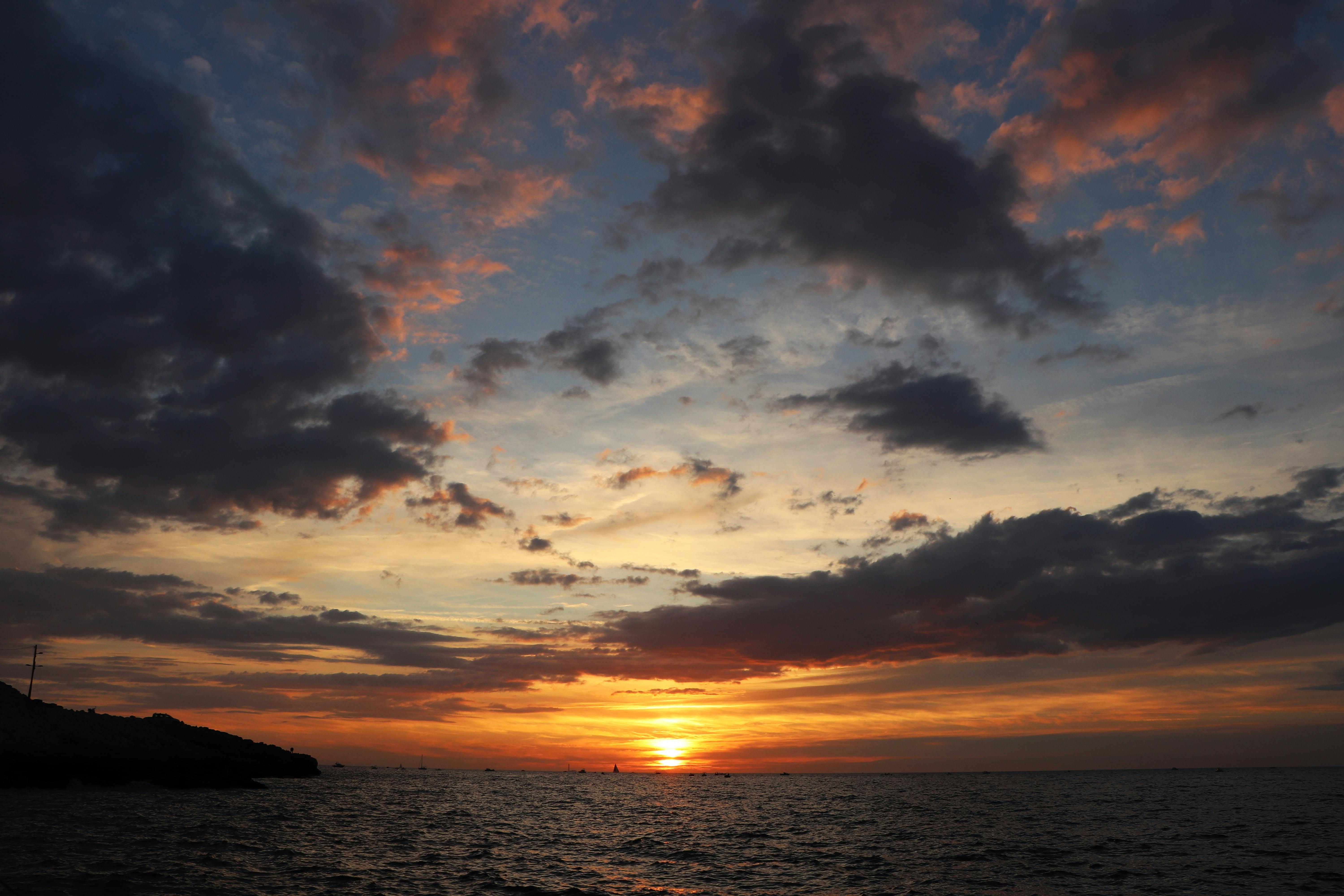 dramatic ocean sunset with vibrant skies