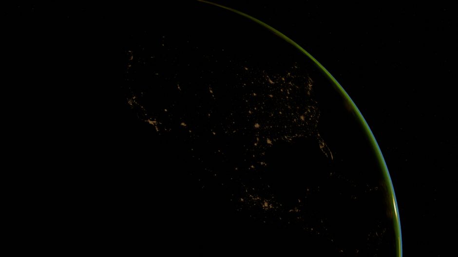 Earth from space showing the thin blue line of the atmosphere - lower your footprint Earth from space showing the thin blue line of the atmosphere - lower your footprint