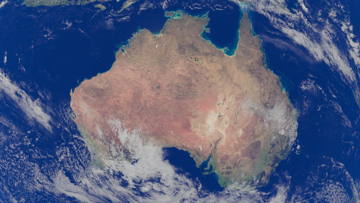 Satellite view of a landmass from space, showing coastline and terrain detail used in earth observation research.