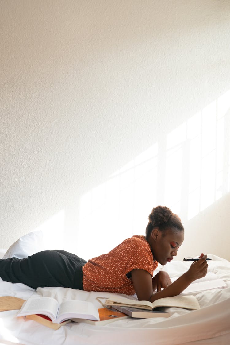 Photo Of Woman Reading Books