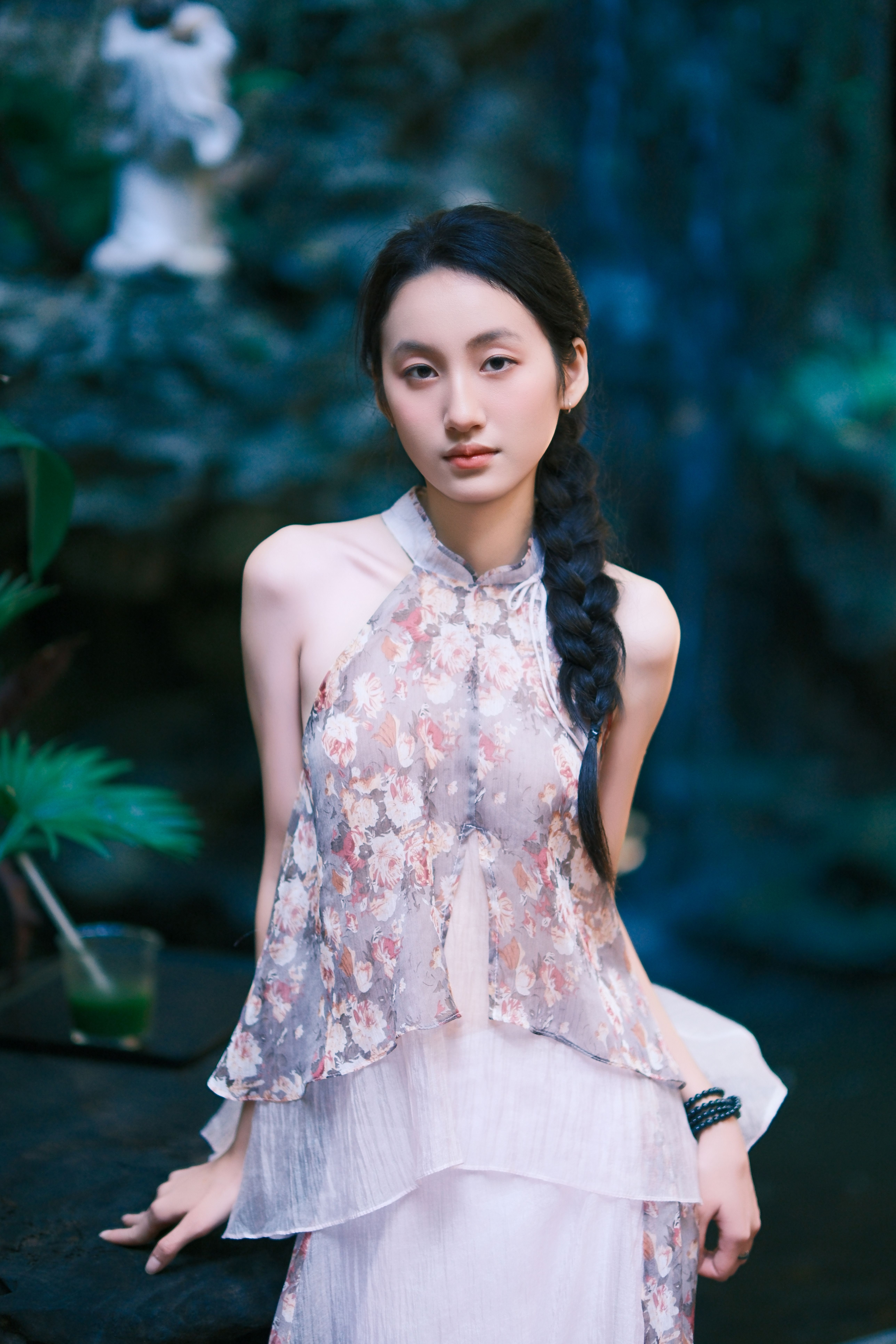 Elegant Portrait of Woman in Floral Dress · Free Stock Photo