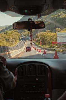 View from car interior of a road trip through Mexican mountains.