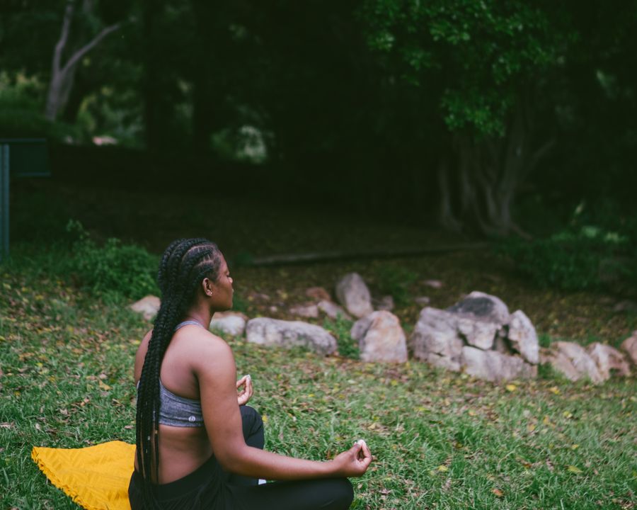 Guest practicing yoga during a wellness retreat