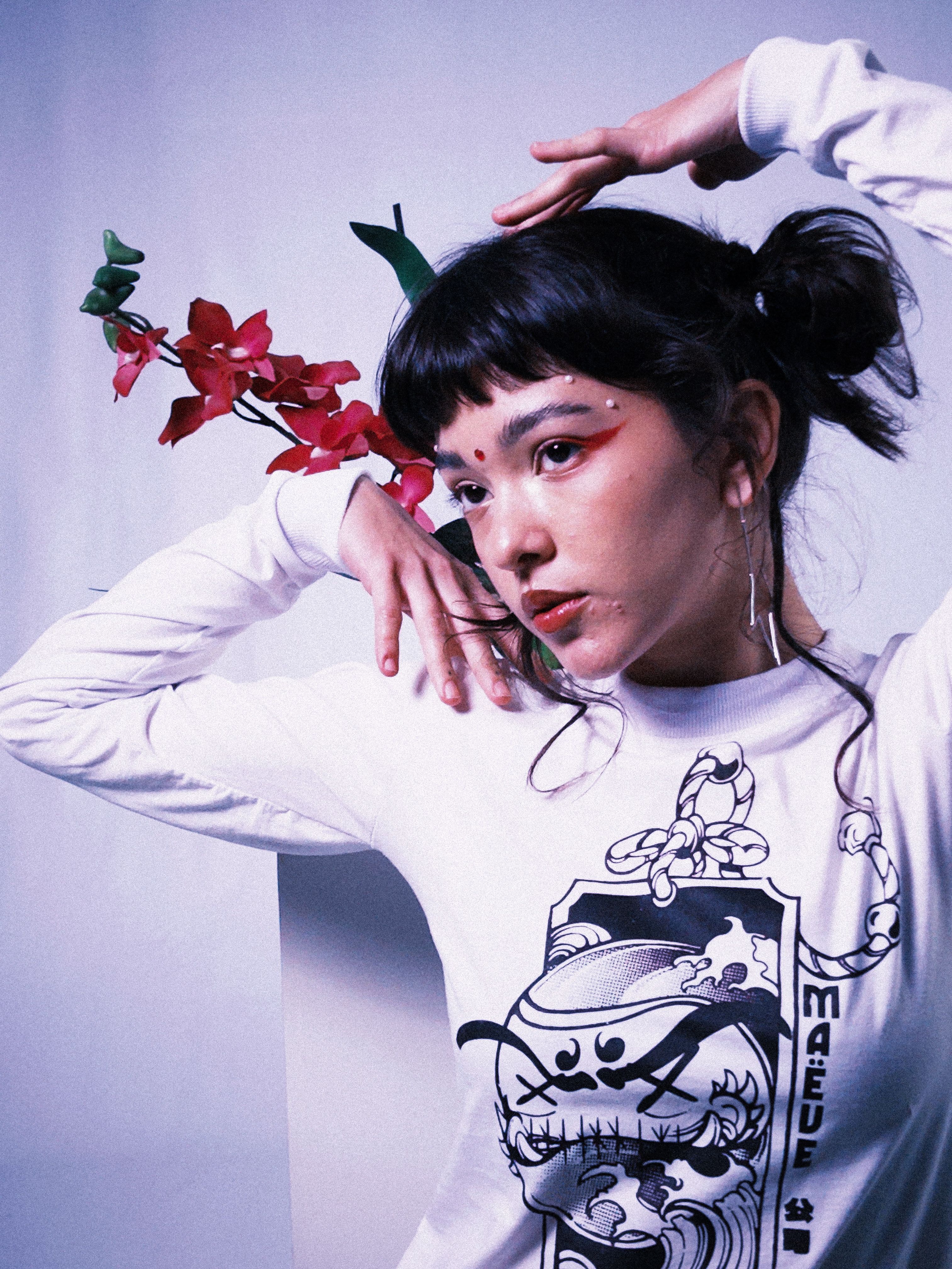 Stylish portrait featuring fashion streetwear and floral art in Porto Alegre.