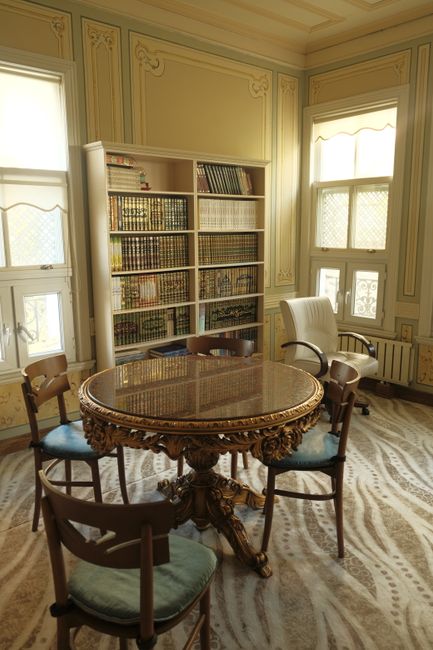 Classic library interior in Istanbul showing bookshelves and antique furniture.