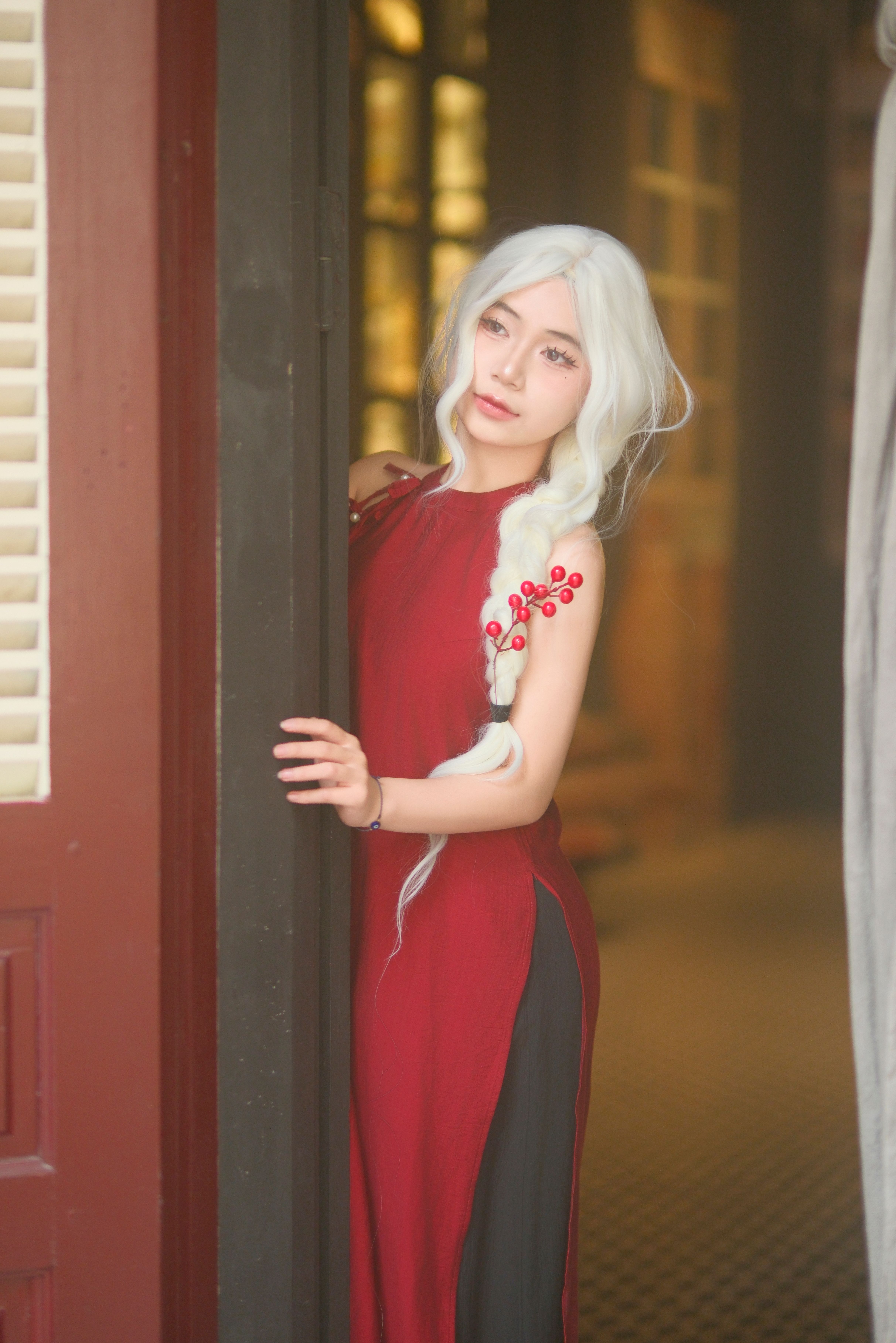 Elegant Woman in Red Dress with White Hair  Free Stock Photo