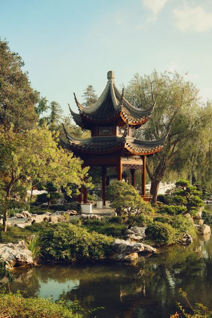 Tranquil Chinese pavilion set amidst lush botanical gardens in San Marino, California.