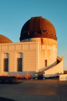 Golden hour view of the iconic Griffith Observatory in Los Angeles, California.