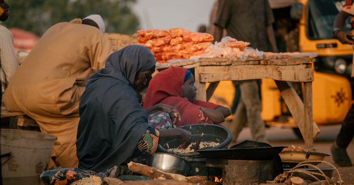 Local Ghanaian street food being prepared at a market stall