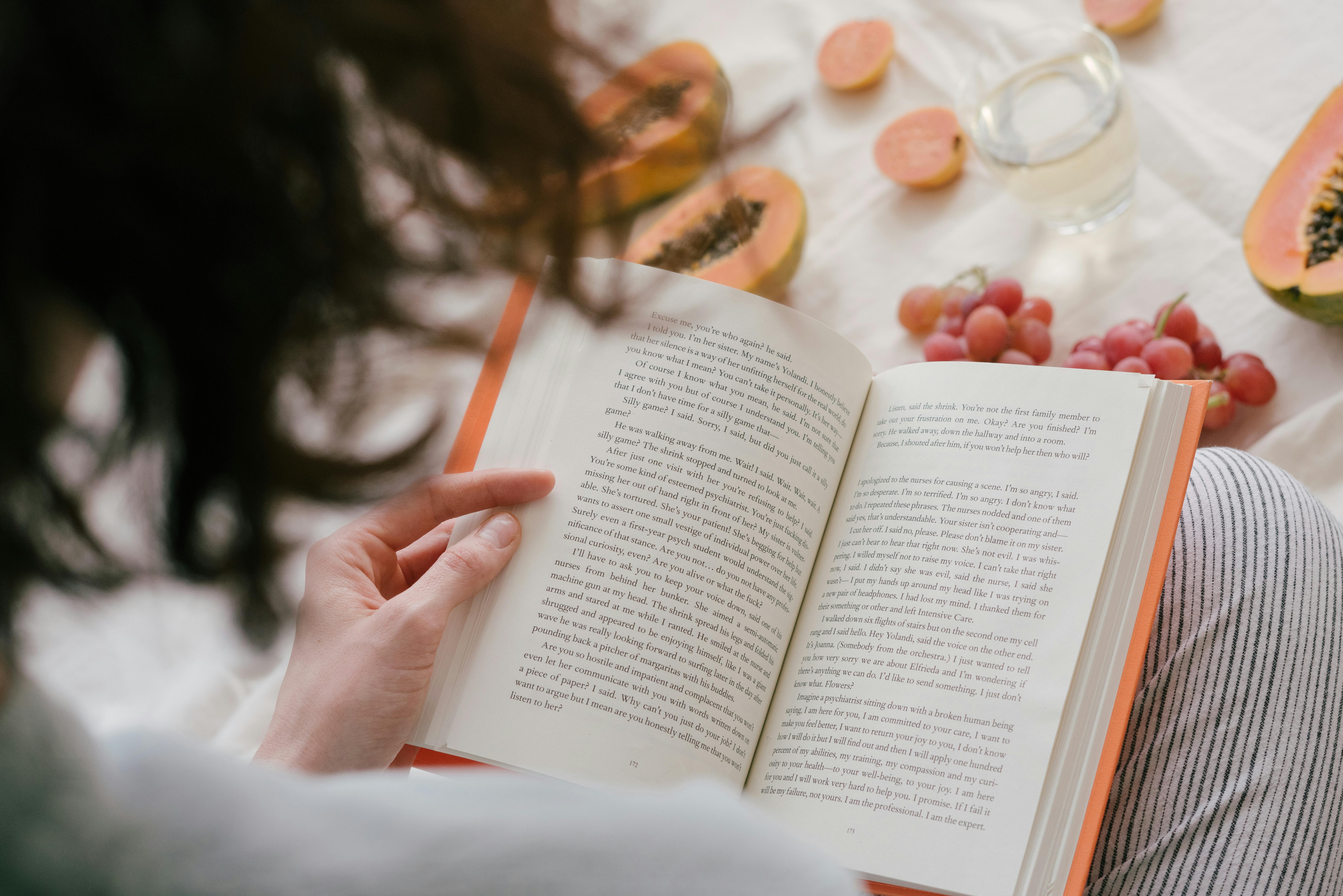 Person Reading A Book · Free Stock Photo