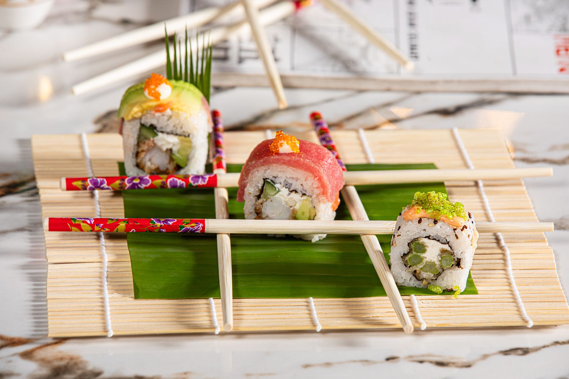 Assorted sushi pieces featuring sea bream and other fresh fish