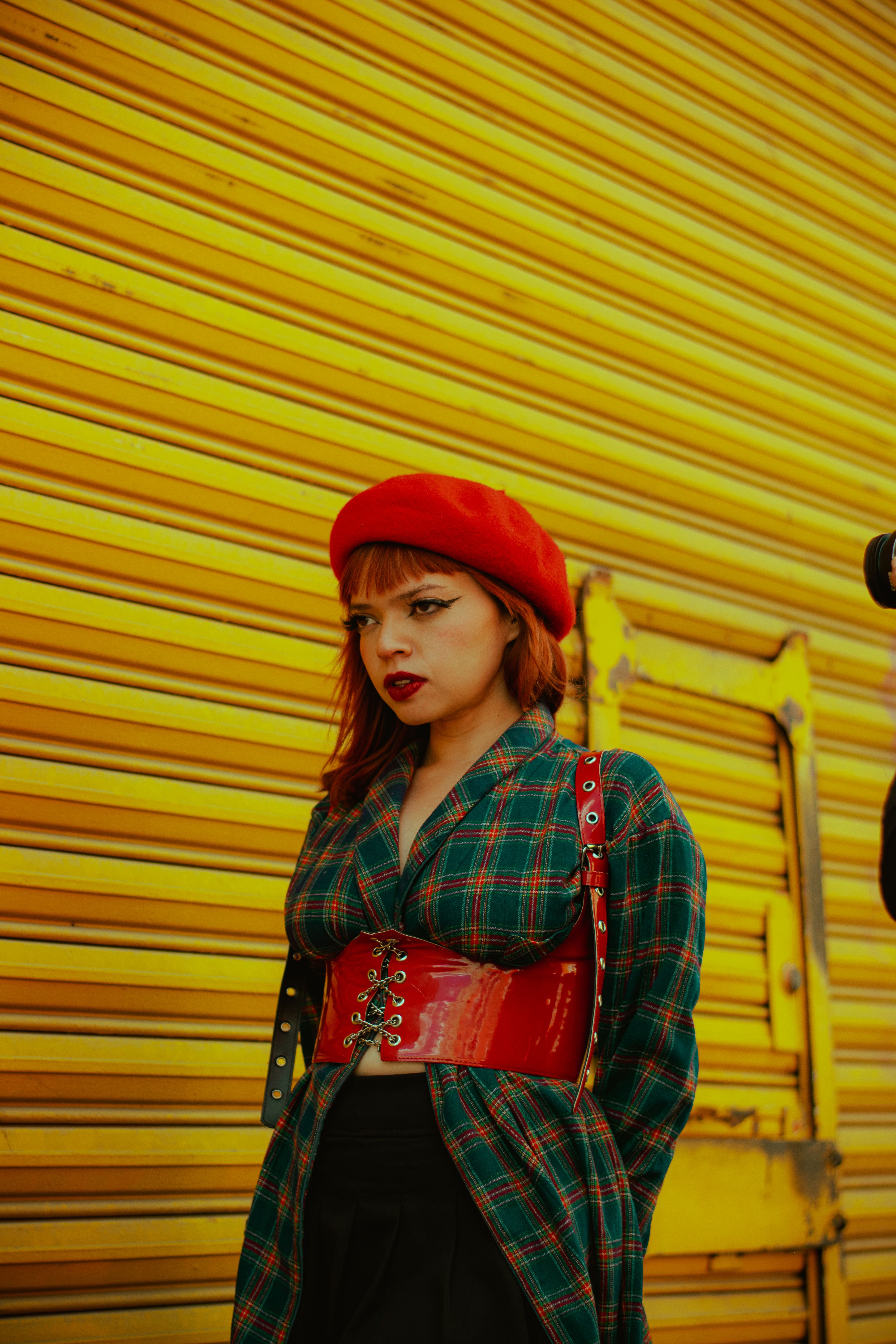 Fall styling idea: green tartan blazer with red beret for a bold autumn check outfit