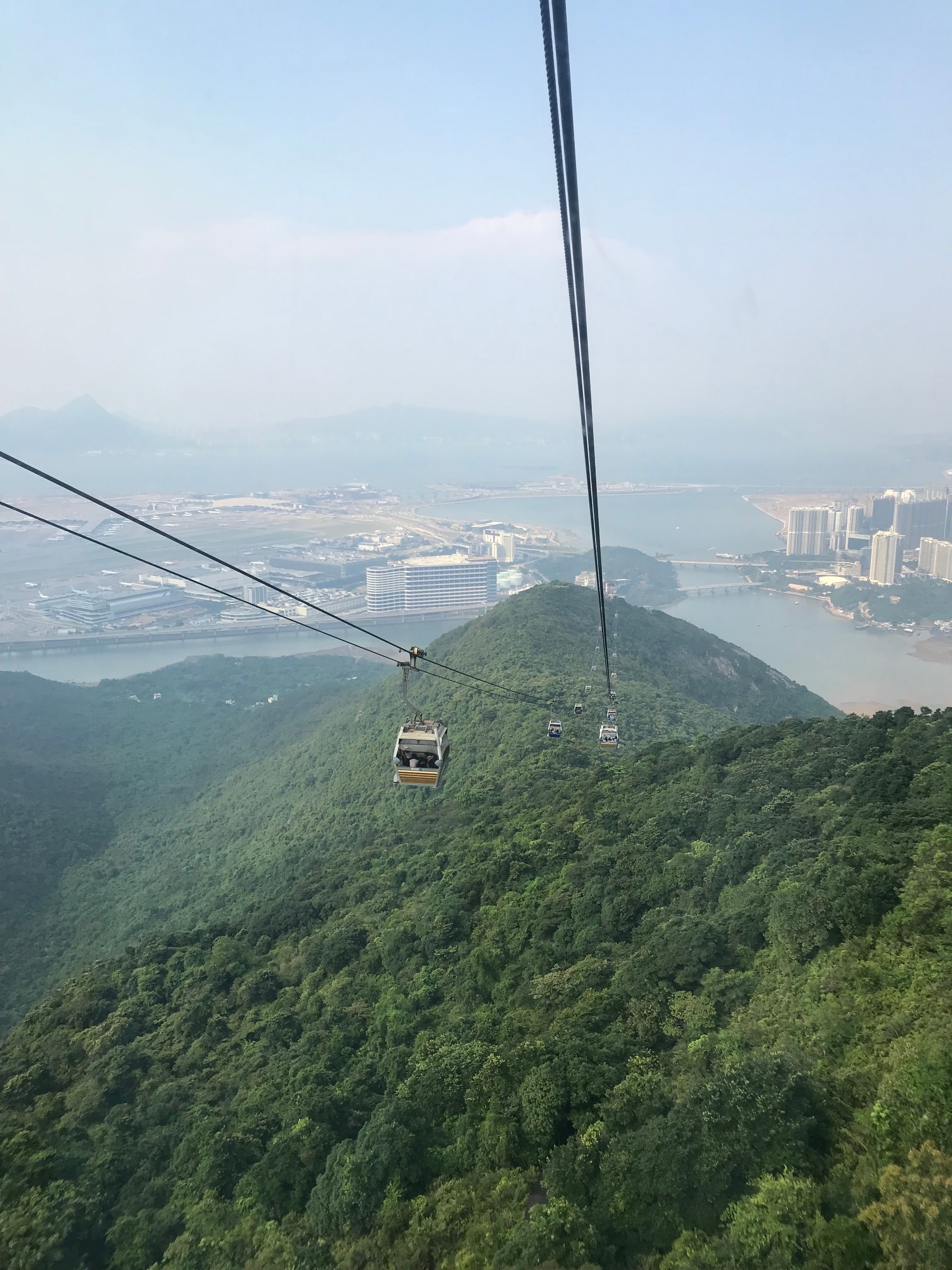 Scenic Cable Car Ride Over Lush Hong Kong Mountains · Free Stock Photo