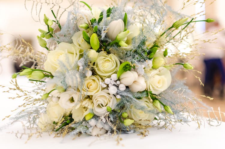 Bouquet Of White Roses On Table