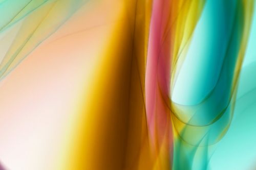 Free Abstract waves of vibrant color creating a dynamic and fluid composition. Stock Photo