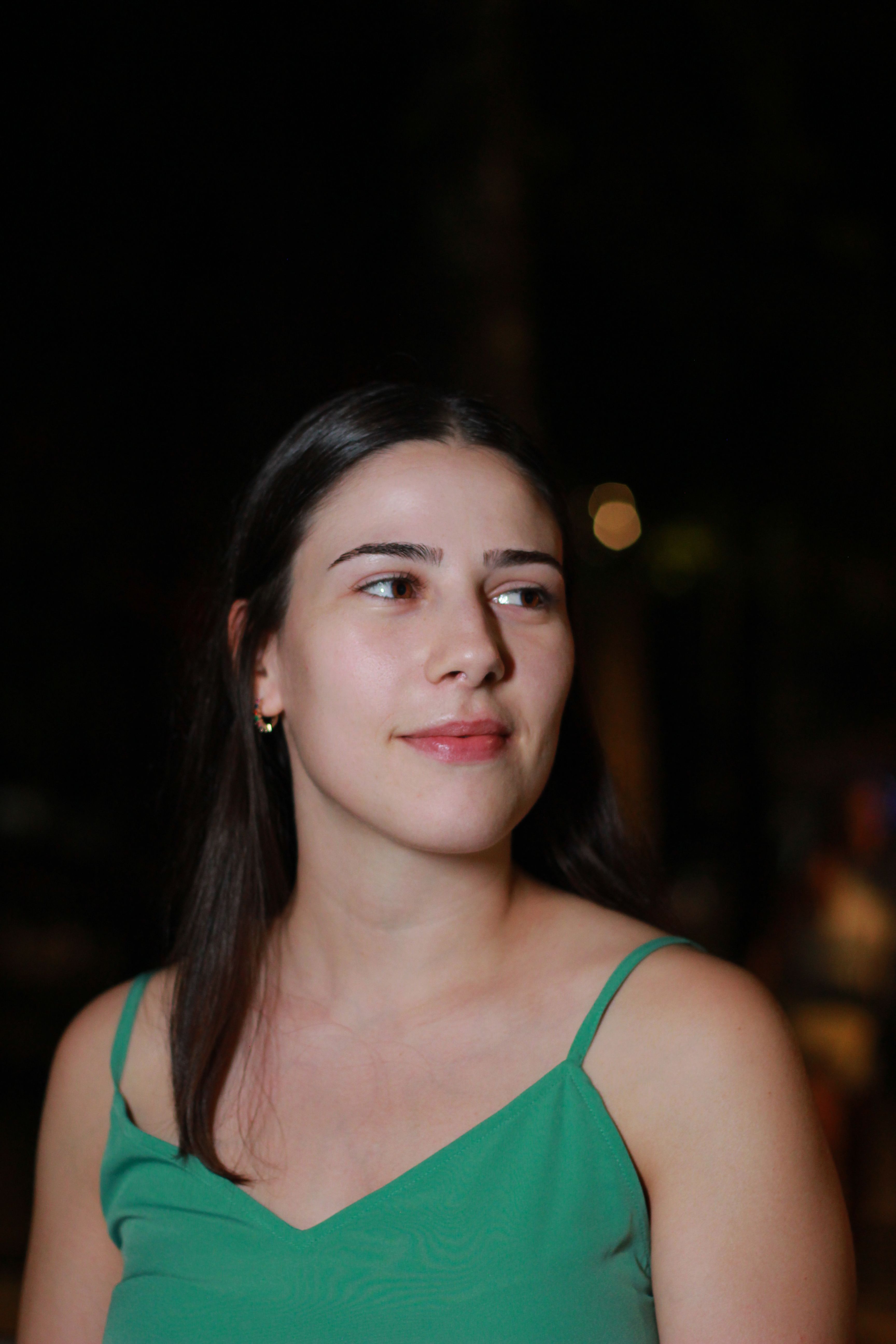Portrait of Woman in Green Dress at Night · Free Stock Photo