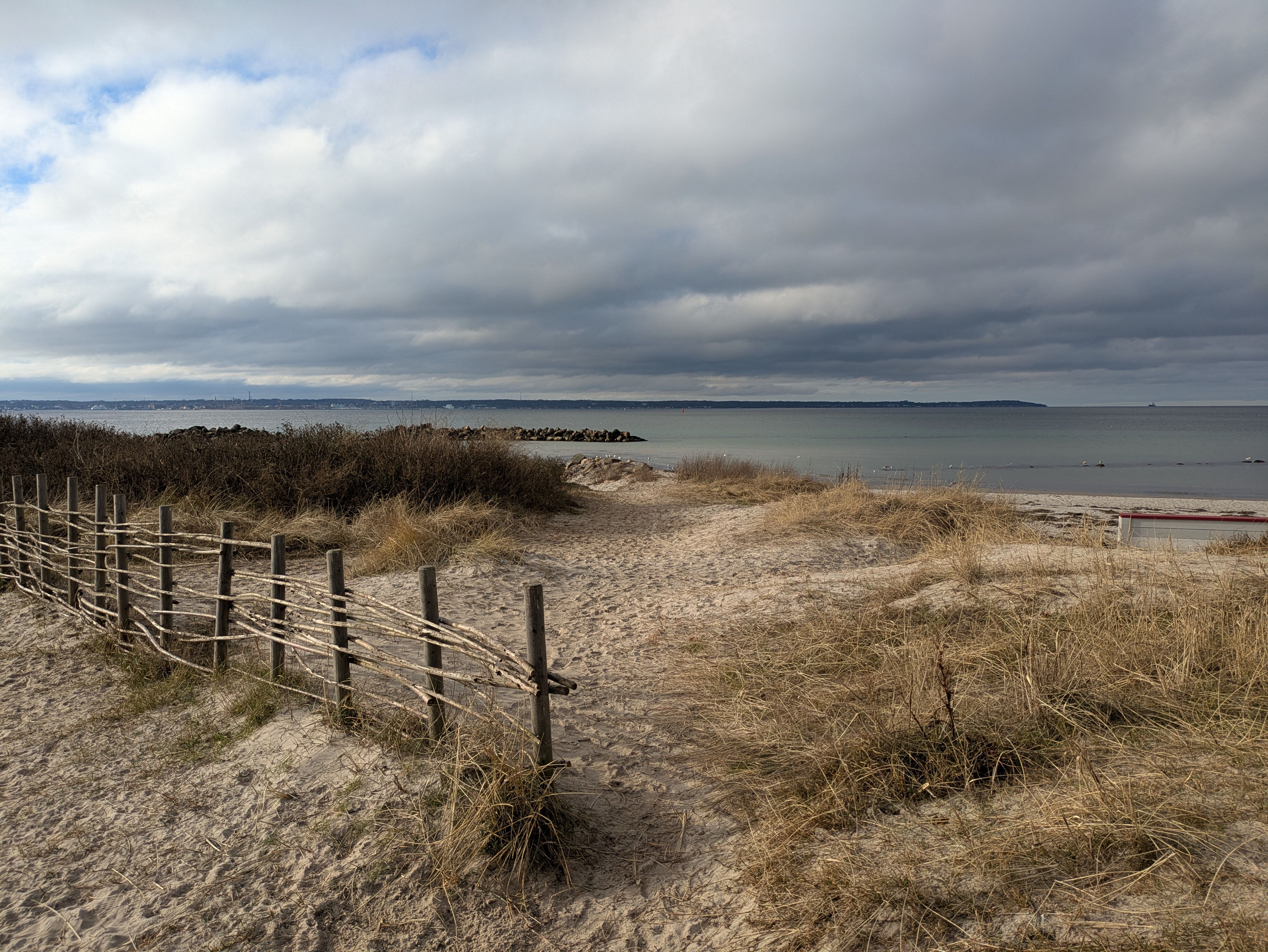 Coastal Sandy Path with Wooden Fence and Sea View · Free Stock Photo