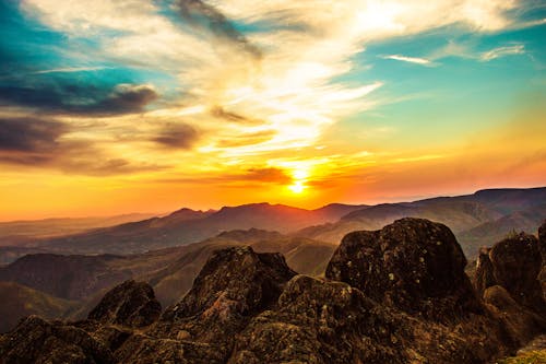 Free View of Mountains At Sunset Stock Photo