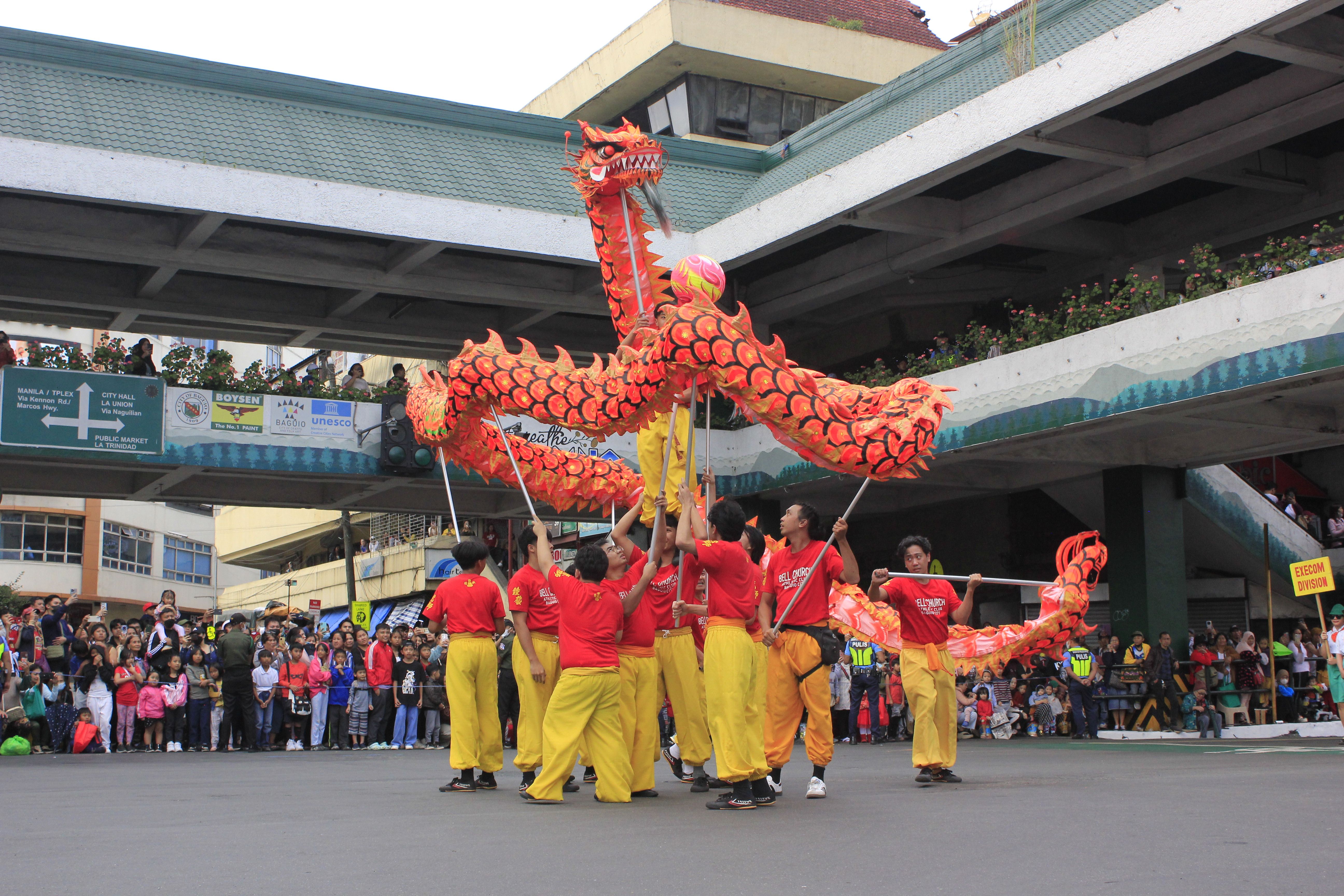 Vibrant Traditional Dragon Dance Festival Celebration · Free Stock Photo