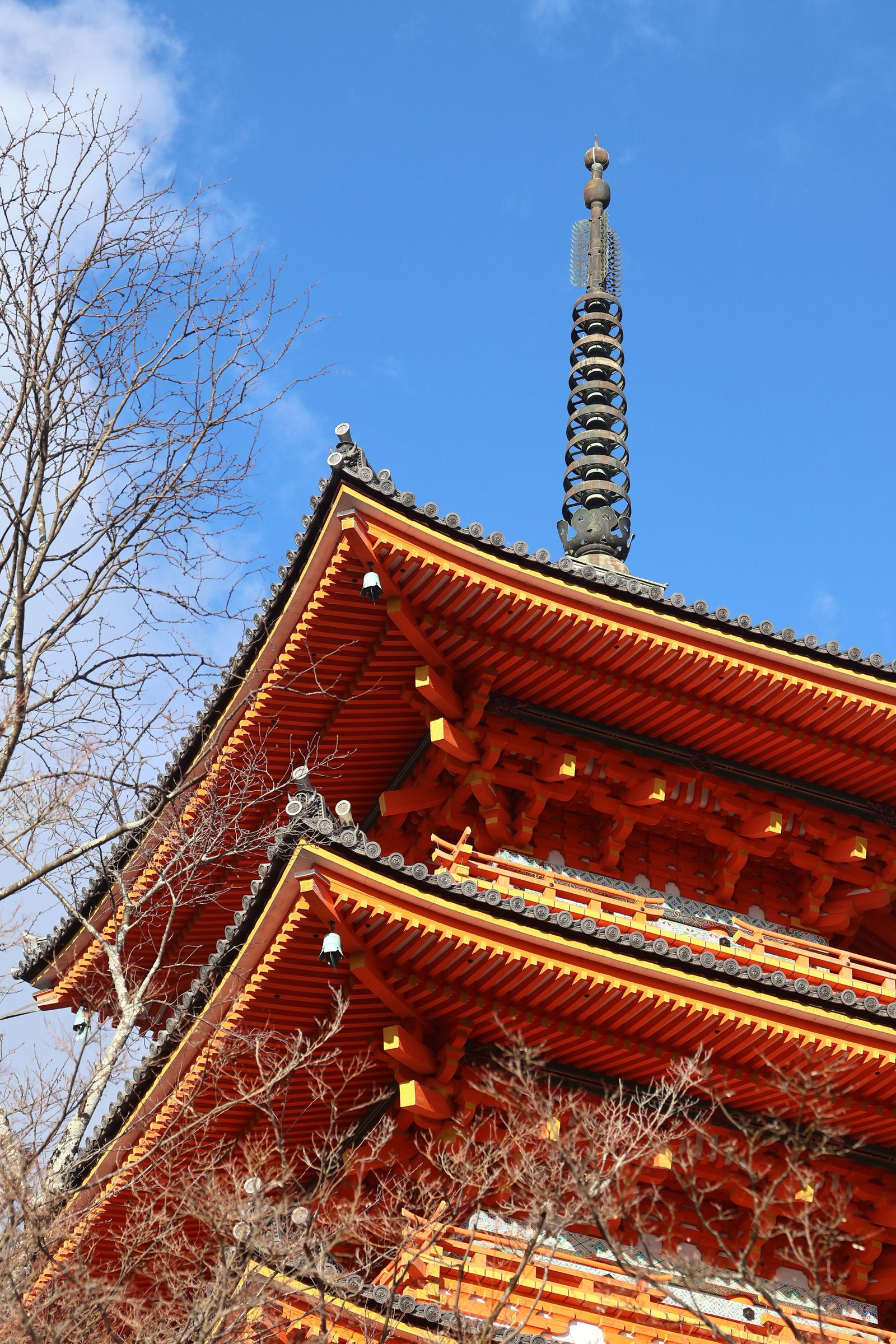 Traditional Japanese pagoda against a blue sky