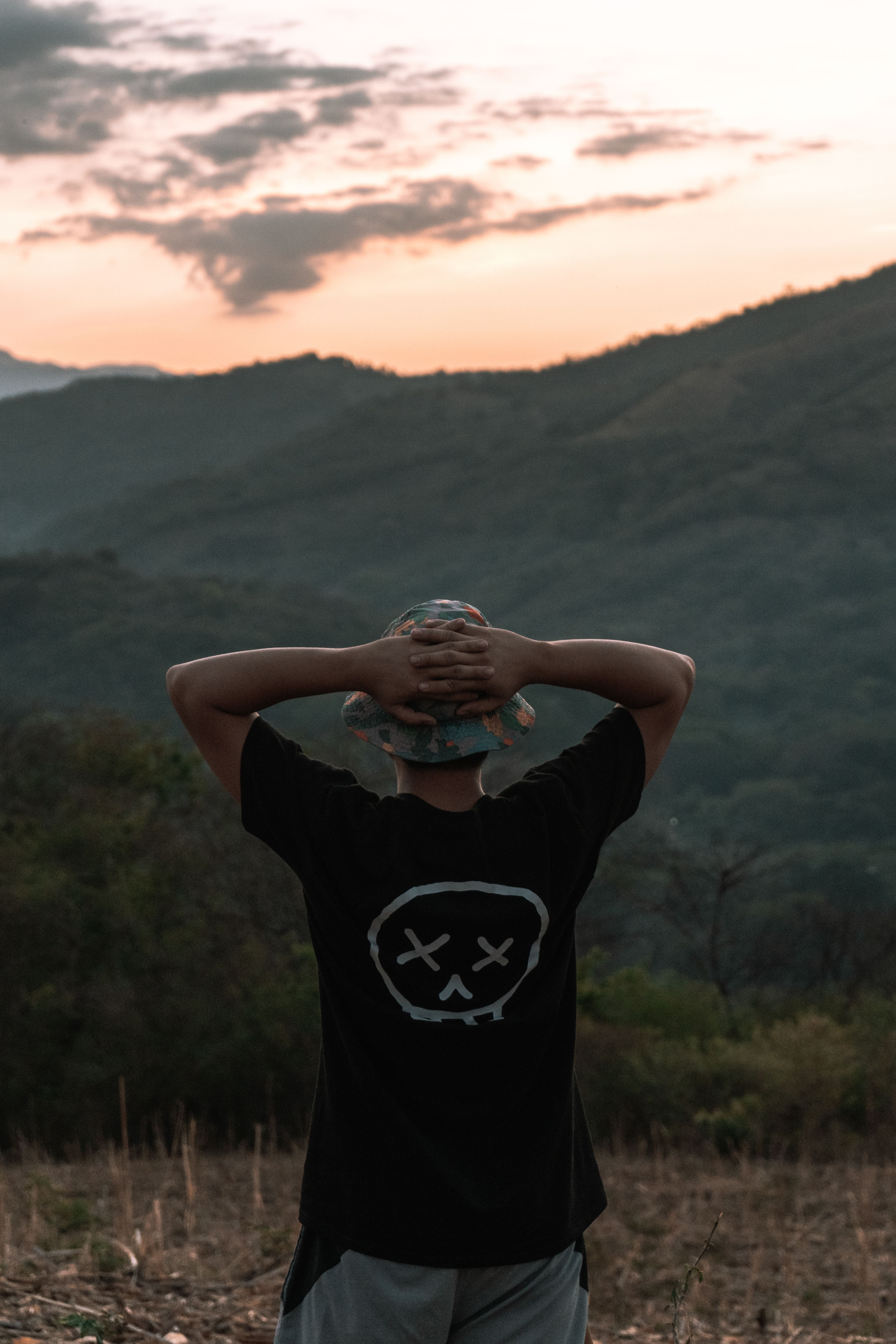 Contemplative Man Enjoys Mountain Sunset View · Free Stock Photo