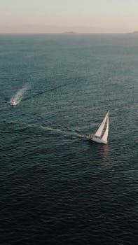 Drone captures a sailboat navigating Istanbul Bosphorus, Türkiye waters.