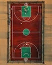 Aerial View of Outdoor Basketball Game at Sunset