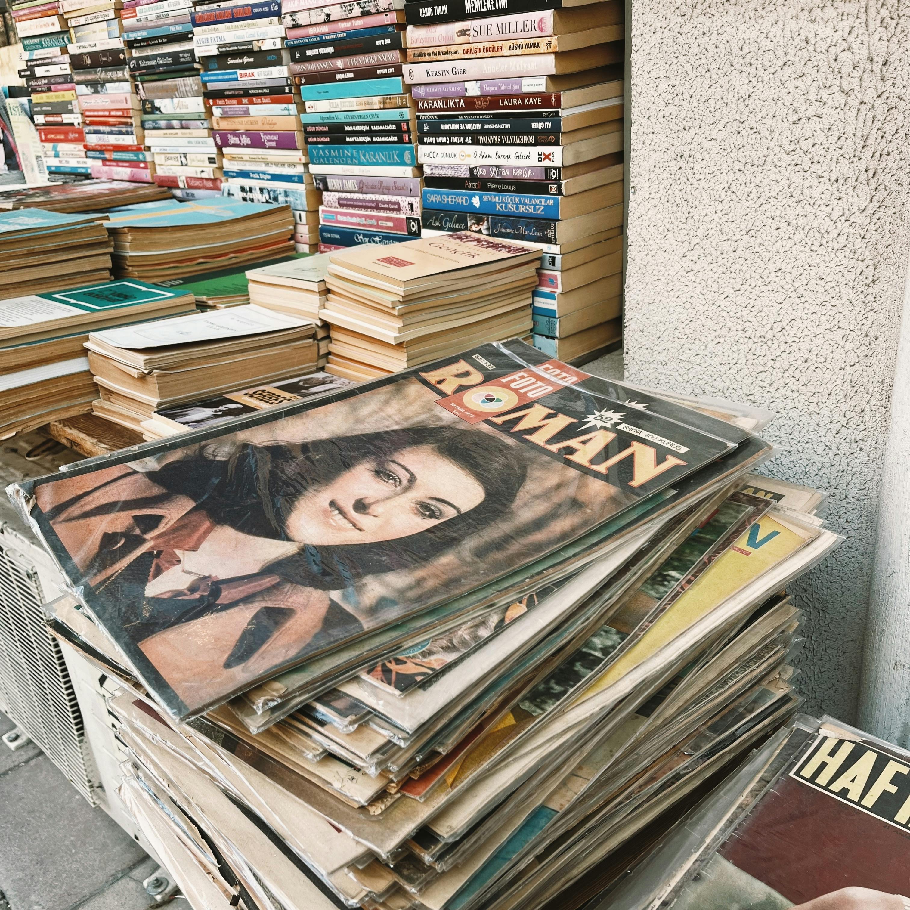 vintage bookstore with stacked magazines and books