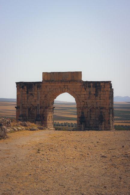 Explore the ancient Roman arch in the historical town of Moulay Idriss Zerhoun, Morocco.