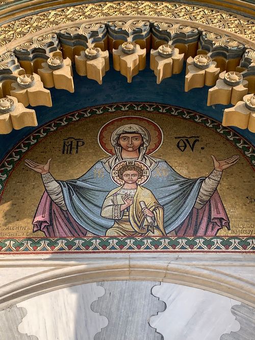 Free Byzantine mosaic depicting Virgin Mary and Christ Child in Romania, illustrating religious art and architecture. Stock Photo