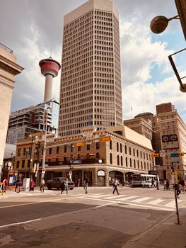 Street view in Calgary, Alberta featuring the iconic Calgary Tower and urban architecture.