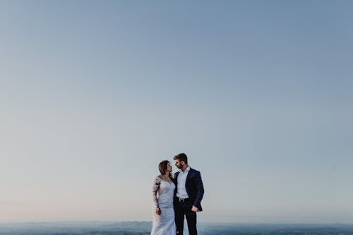 Free Photo Of Couple Standing Near Each Other Stock Photo