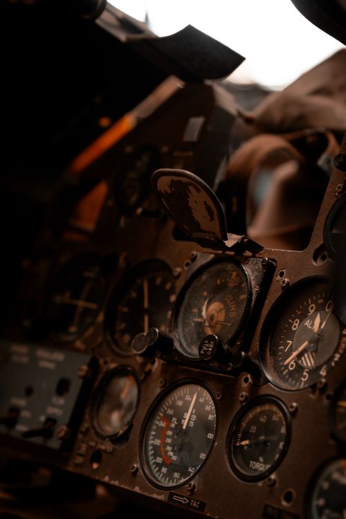Free Close-up view of a vintage aircraft cockpit showcasing analog flight instruments. Stock Photo