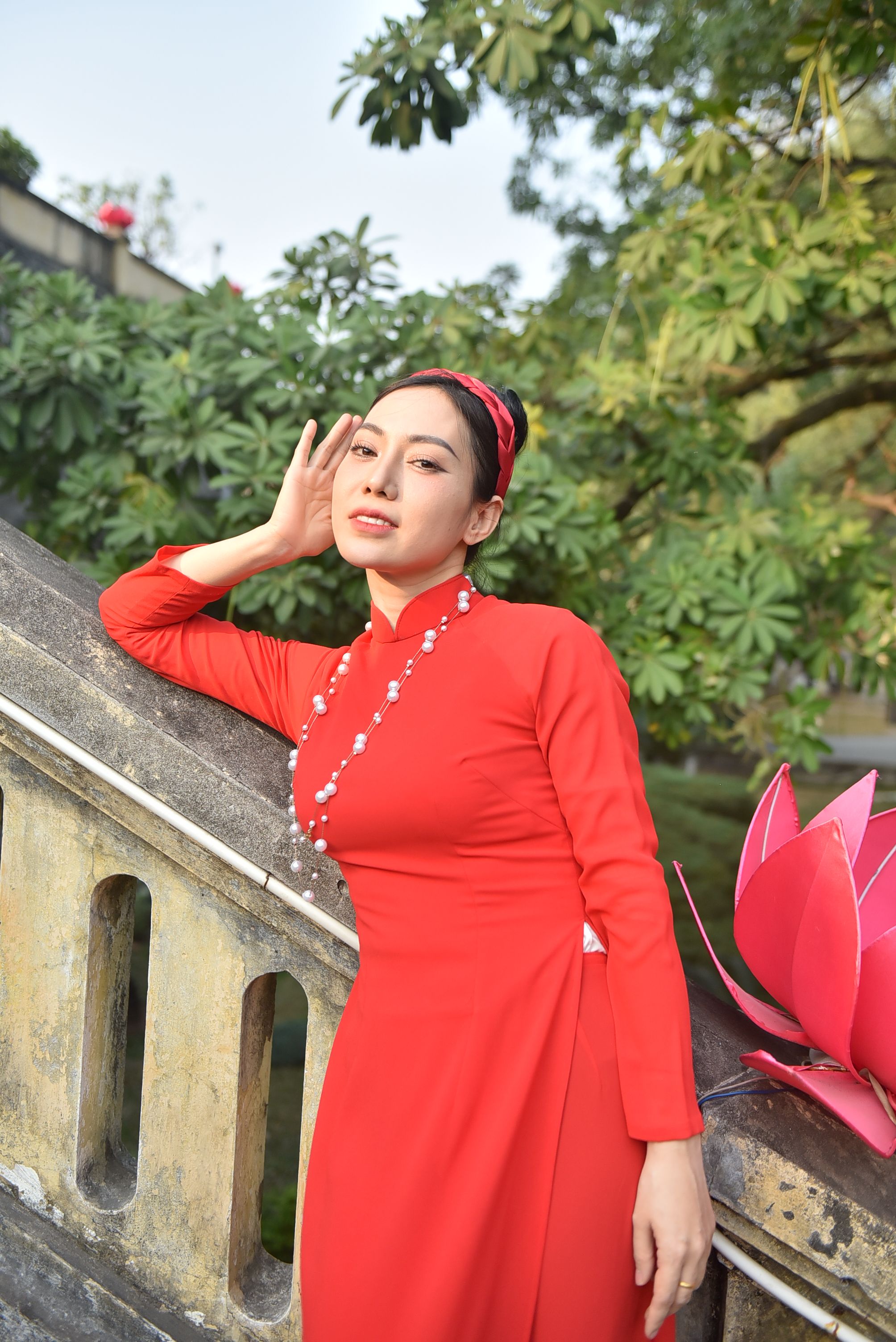 Elegant Woman in Red Traditional Dress Outdoors · Free Stock Photo