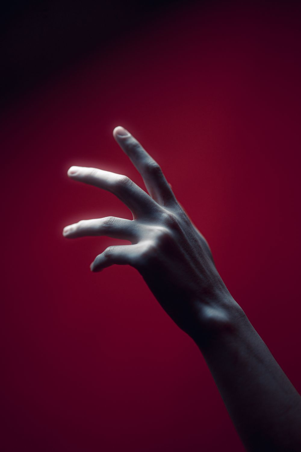 Abstract Hand Normal Abstract Artistic Hand on Red Background · Free Stock Photo