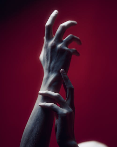 Abstract Hand Normal Abstract Artistic Hand on Red Background · Free Stock Photo