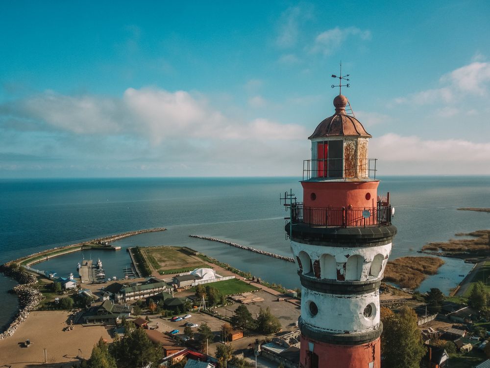 Lighthouse Viewpoint Aerial View of Historic Lighthouse by the Sea · Free Stock Photo