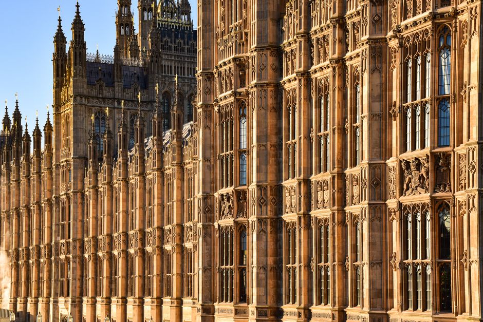 Close-up view of the ornate Gothic architecture of Westminster Palace, London, England.