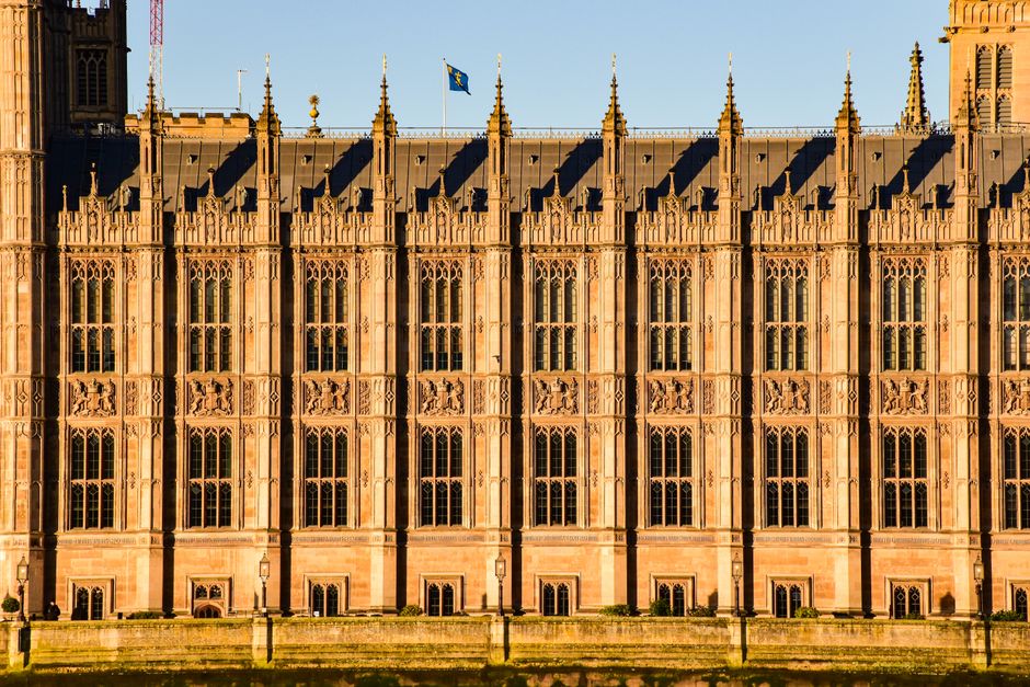 Close-up view of Westminster Palace's intricate Gothic architecture in London, UK.