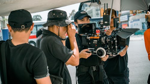 Free Photo Of Camera Crew Standing Near Each Other Stock Photo