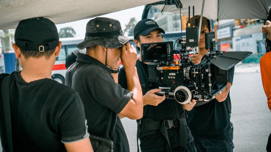 Film crew creating an outdoor public awareness campaign