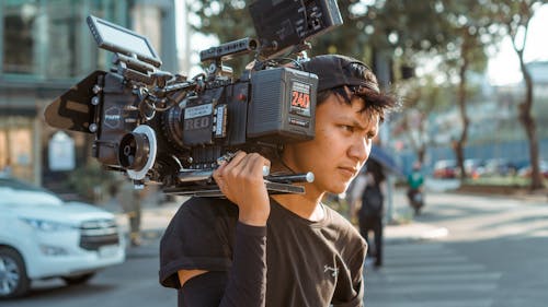 Foto Van Man Met Cameramateriaal