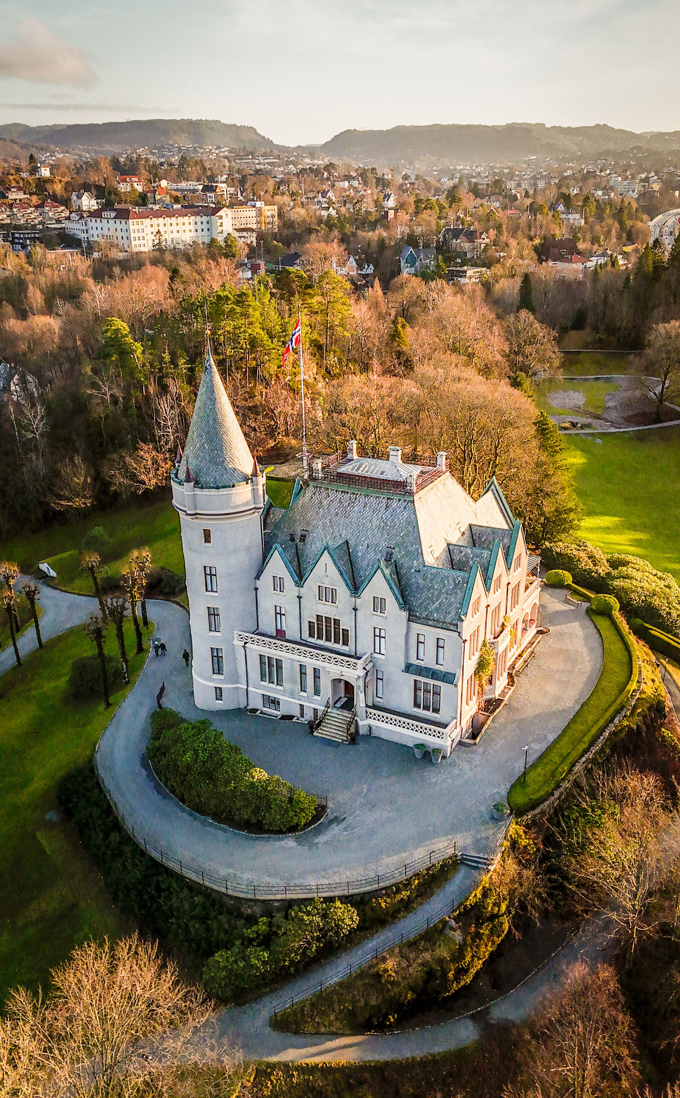 Aerial View of Historic Castle Surrounded by Nature · Free Stock Photo