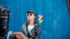 Woman Wearing Black Patent Leather Jacket