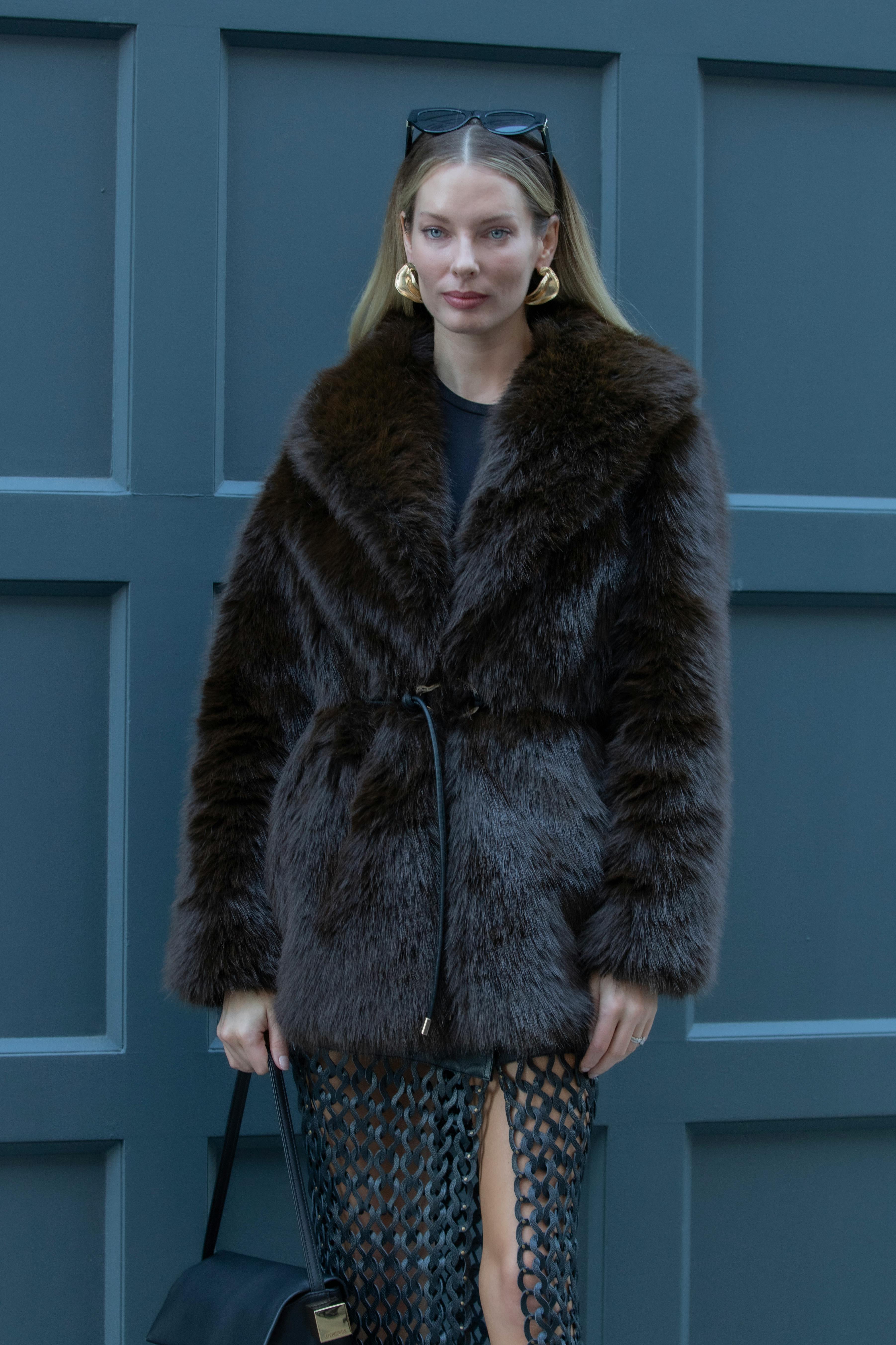 Free Sophisticated winter fashion with fur coat and modern accessories in NYC. Stock Photo