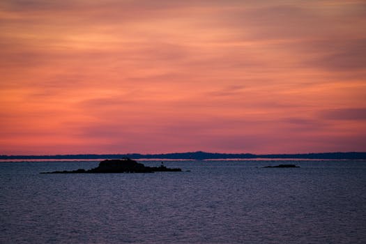 Tranquil dawn scene with vibrant sky over Cove Island Park, Stamford, Connecticut.