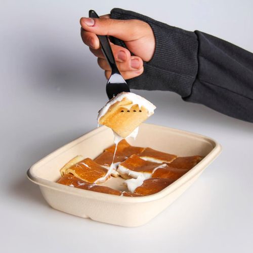 Free Close-up of a person enjoying a sweet dessert with a fork, highlighting textures. Stock Photo