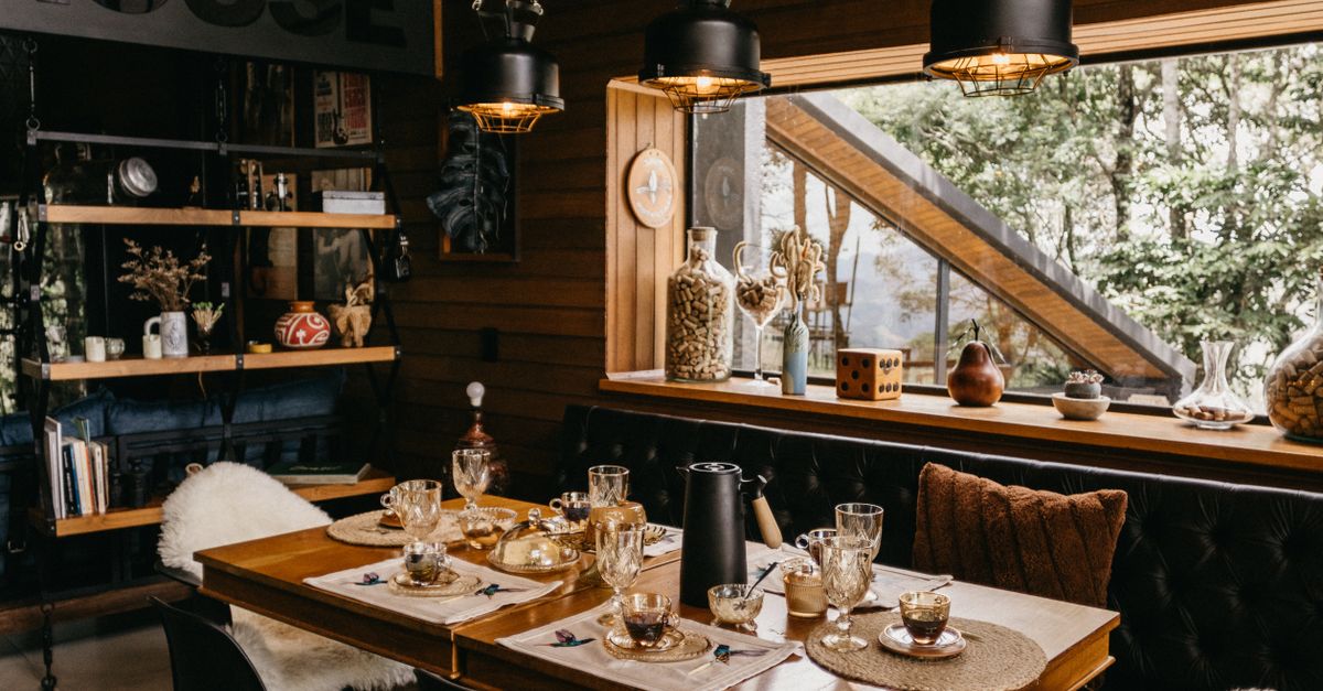 Cozy Dining Room with Wooden Interior Design · Free Stock Photo