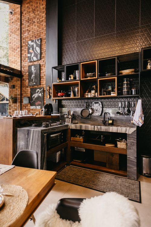 Free Stylish modern kitchen with rustic elements and open shelving in Espírito Santo, Brasil. Stock Photo